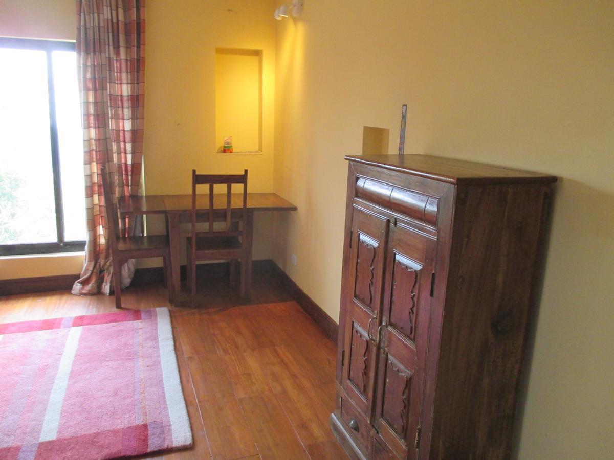 Hotel Swiss Dakshinkali Rum bild