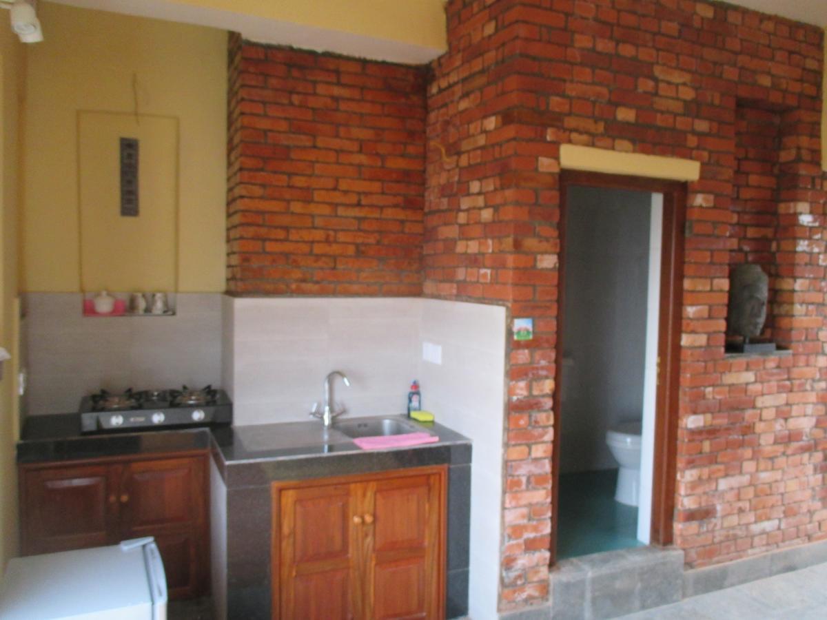 Hotel Swiss Dakshinkali Rum bild
